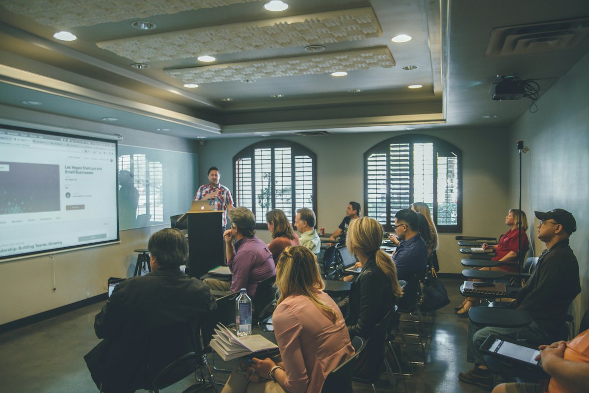Trainer presenting to a seated group